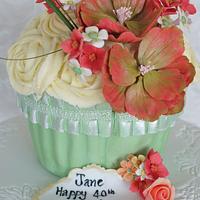 Giant Cupcake with Cascade of Orange Flowers