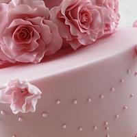 Pink Wedding cake with custom topper