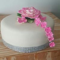 Sweet cake with pink flowers
