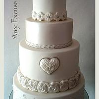 White on white wedding cake 