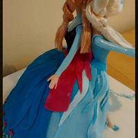 Anna and Elsa Frozen doll cake