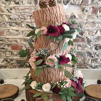 Topsy turvy rustic wedding cake