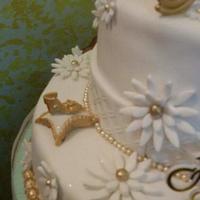 Gold and white cindrella themed chocolate cake 