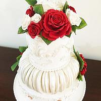 Classic White/ivory wedding cake with Red White and ivory sugar roses