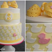 Baby shower cake with ducks and baby Crocs