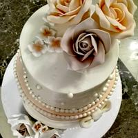 Ivory and coral engagement cake