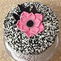 Black and white sprinkle cake