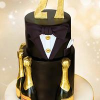 Champagne and tux cake
