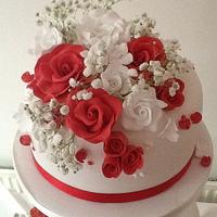 Red and white rose wedding cake