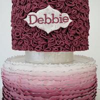 vintage style Ombre ruffle cake in dusky pink with brushed silver detaling