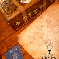 Vintage traveling suitcase cake with edible map and passports