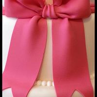 Pink bow wedding cake 