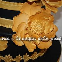 Gold magnolia flower cake