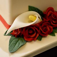 Roses and lilies wedding cake