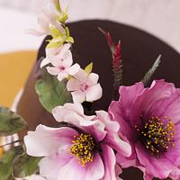Cosmos and Stephanotis floral arrangement