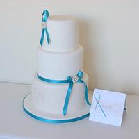 Brooch & damask wedding cake