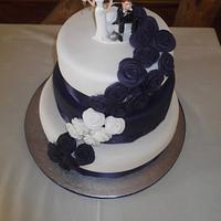Purple & White rose wedding cake 