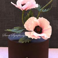 Ganached cake with poppies 