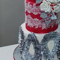 Wedding cake in red, silver and pearls