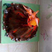 Volcano and dinosaurs cake
