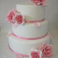Large pink roeses wedding cake