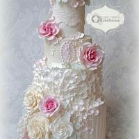 cream and white rose stripe cake