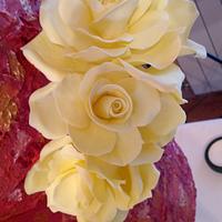  painted cake and yellow roses