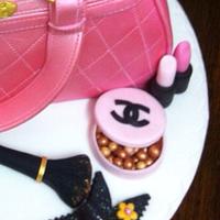 Pink pauls boutique handbag with cosmetics