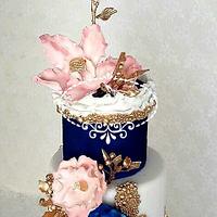 Floral wedding cake in blue and pink