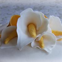 Yellow ombre ruffle cake with Cala lillies
