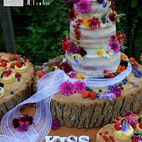 summer weddingcake, semi naked with all edible flowers