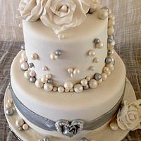 wedding cake with bubbles and fondant roses