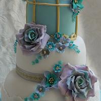 Lovebirds and birdcage golden wedding anniversary cake