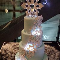 Snowflake engagement cake