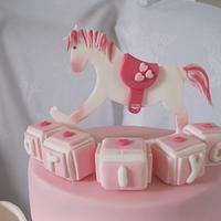 rocking horse christening cake