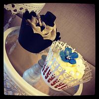 Wedding cupcake tower with bride & groom cupcakes!
