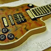 Guitar buttercream shaped cake