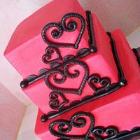 hot pink with black hearts wedding cake