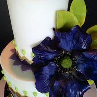 Purple, gold and Green Chevron cake with Purple fantasy flower.