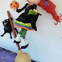 Halloween cake: Wendy the witch on a broom