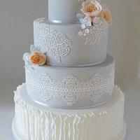 Grey and peach lace wedding cake