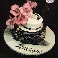 Black and white cake whit an elegant phalaenopsis orchid
