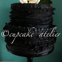 Magnolia & black ruffle cake