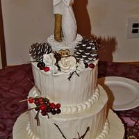 Winter wedding cake berries and pine cones