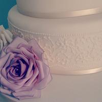 Ivory and dusky pink rose wedding cake