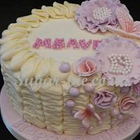 Ruffle cake with ruffle flowers, pearls & butterflies