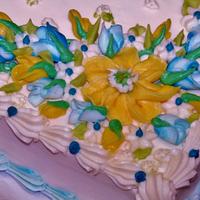 Blue and yellow buttercream flowers cake