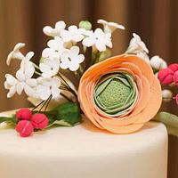 Peach and white wedding cake