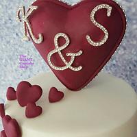 Heart plume engagement cake
