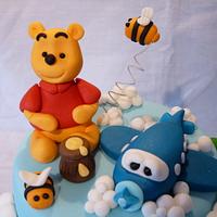 TWO TIERED WINNIE THE POOH CAKE WITH AEROPLANE